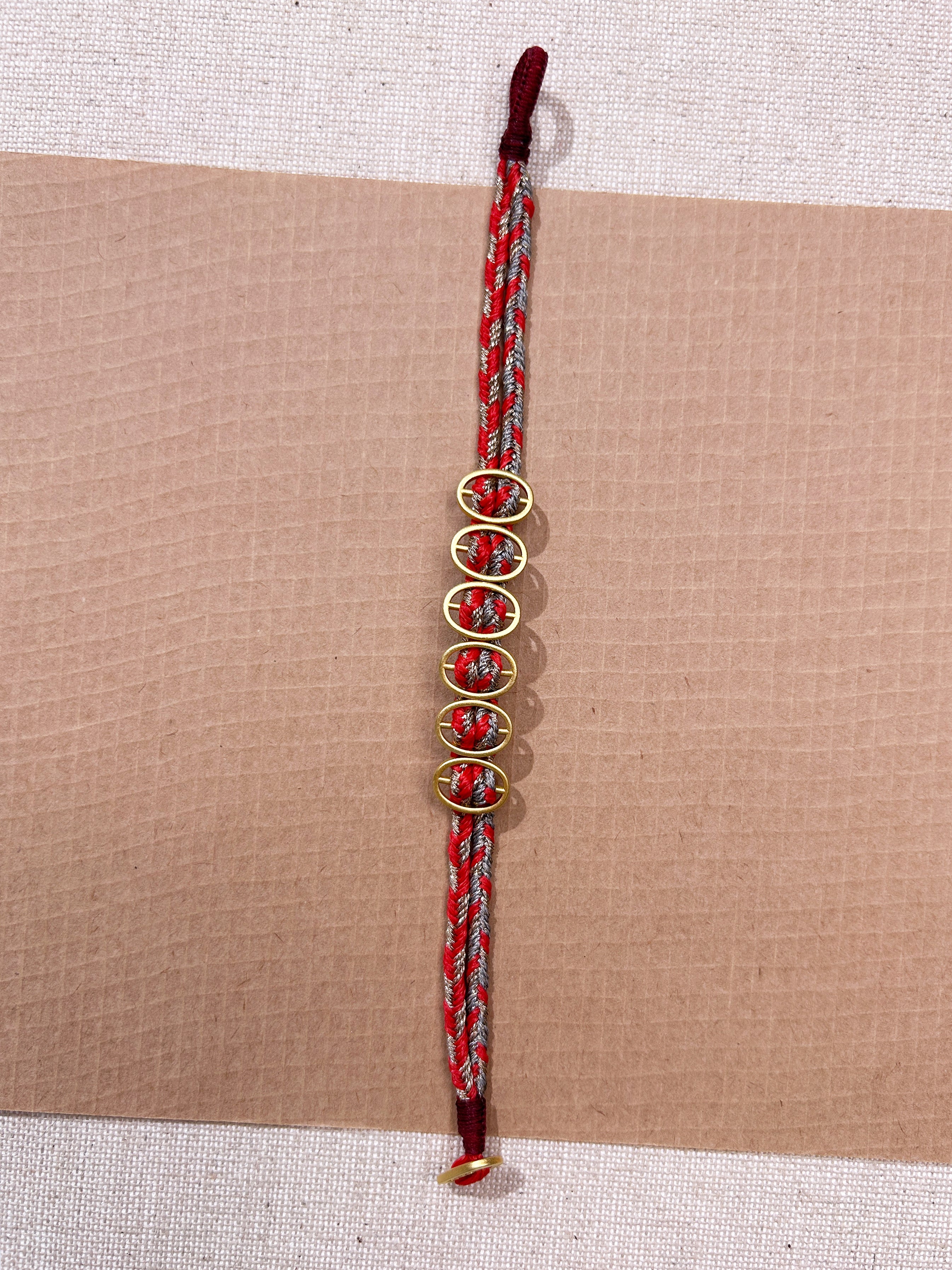 NOEUD Bracelet tressé rouge